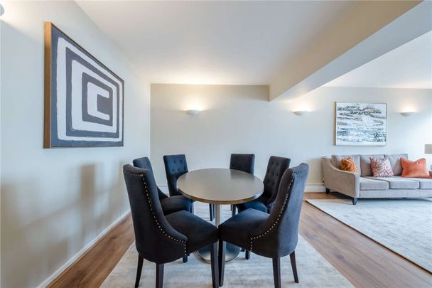 This large, bright and spacious two bedroom apartment is on the 6th floor and is located in the heart of Victoria. - Photo 1