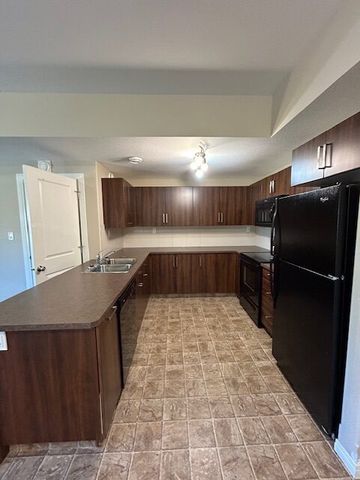 Executive 2 Bedroom Condo in Springbrook – Sept 1st Possession - Photo 2