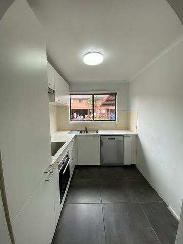 Renovated Townhouse In Convenient Location! - Photo 4