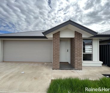 21 Sandalwood Road, Davoren Park, SA 5113 - Photo 1