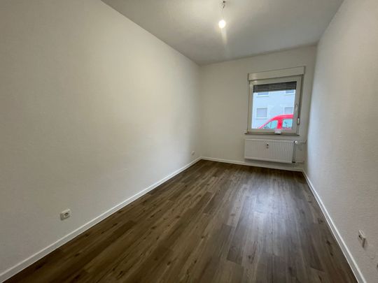 Gemütliche EG-Wohnung mit modernem Duschbad - Foto 1