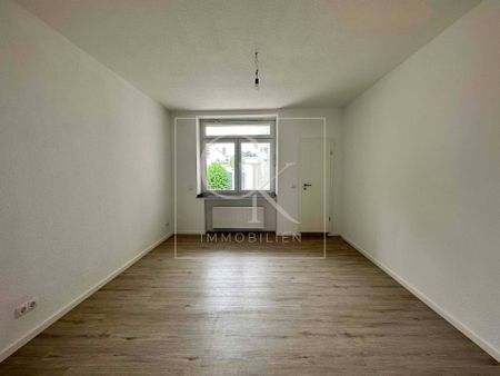 Inmitten der Stadt: 2-Zimmer-Wohnung mit Einbauküche - Photo 3