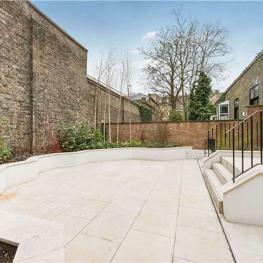 A Masterfully Refurbished Six-Bedroom Townhouse on Cranley Place - Photo 1