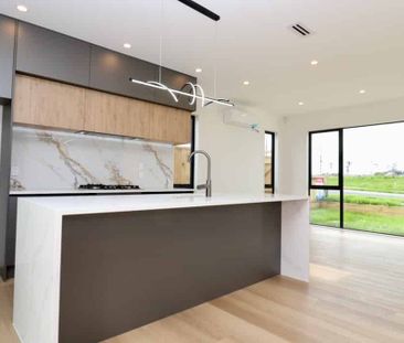 Enjoy the Karaka Lifestyle Modern 4 Bedroom, 2 Bathroom Home - Photo 1