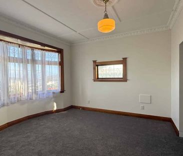 Character-Filled Three-Bedroom Home with Modern Comforts in Vogeltown - Photo 1