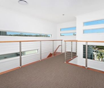 Executive Waterfront Living with Pool in Sought-After Twin Waters! - Photo 6