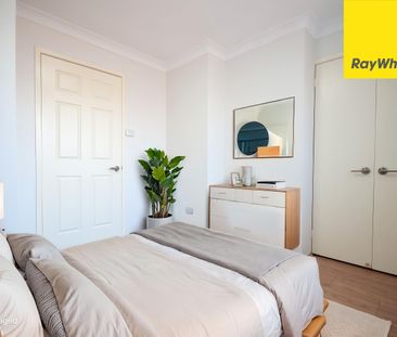 UPDATED STREET-FACING TOWNHOUSE WITH SPACE, STYLE & CONVENIENCE - Photo 3