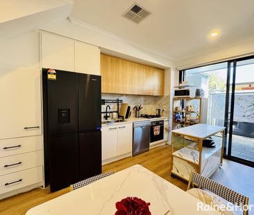 Stylish Low-Maintenance Living Near City & Beach - Photo 4