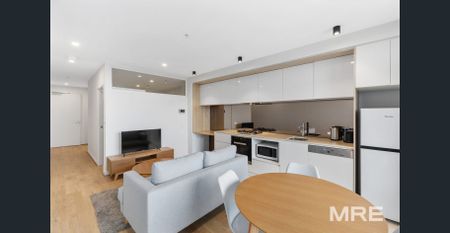 Designer Furnished Apartment - Photo 2