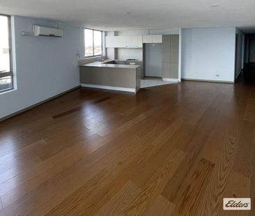 Sunny North/East facing apartment with stunning city and ocean views. - Photo 1