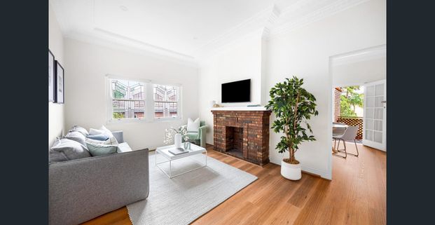 A Beautifully Enhanced Art Deco Apartment In An Ultra Convenient Village Setting - Photo 1