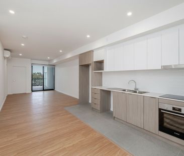 BRAND NEW APARTMENT IN BRAND NEW COMPLEX - Photo 3