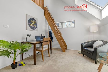 Spacious Designer Home with Flexible Living Across Three Levels - Photo 4