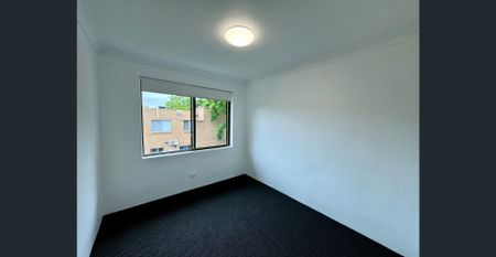 Upgraded Top Floor Apartment with Balcony & LUG! - Photo 2