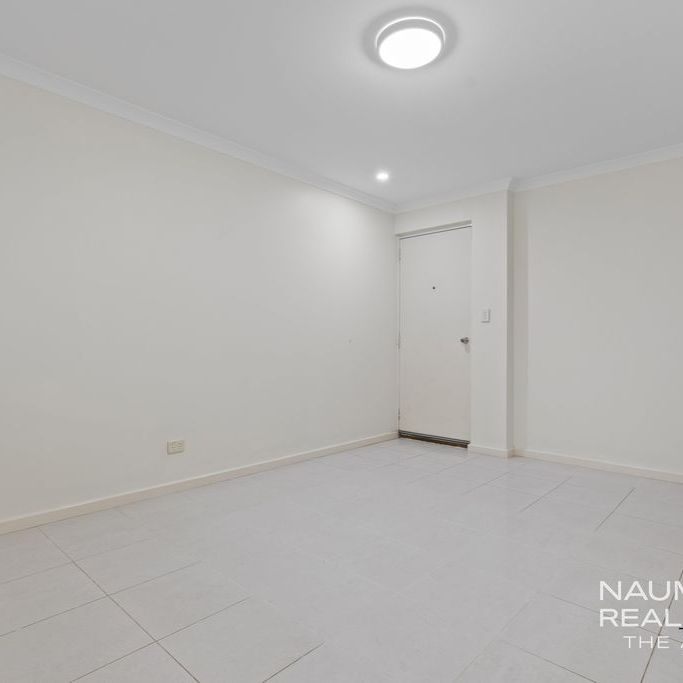 Modern Comfort and Convenience in a Private Rear Setting - Photo 1