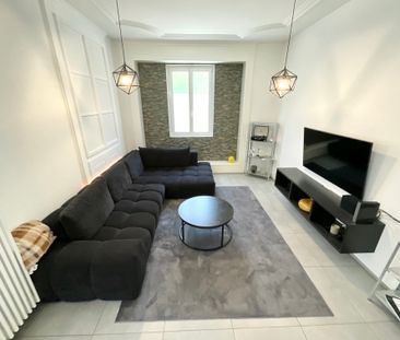 Charmant appartement de 4,5 pièces avec cachet au rez-de-chaussée - Photo 2