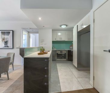 TOP FLOOR, PARKLAND OUTLOOK + AIR CONDITIONED TWO BEDROOM UNIT - Photo 5