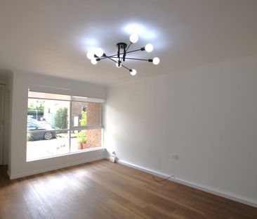 Newly Renovated 3-Bedroom Unit - Photo 5