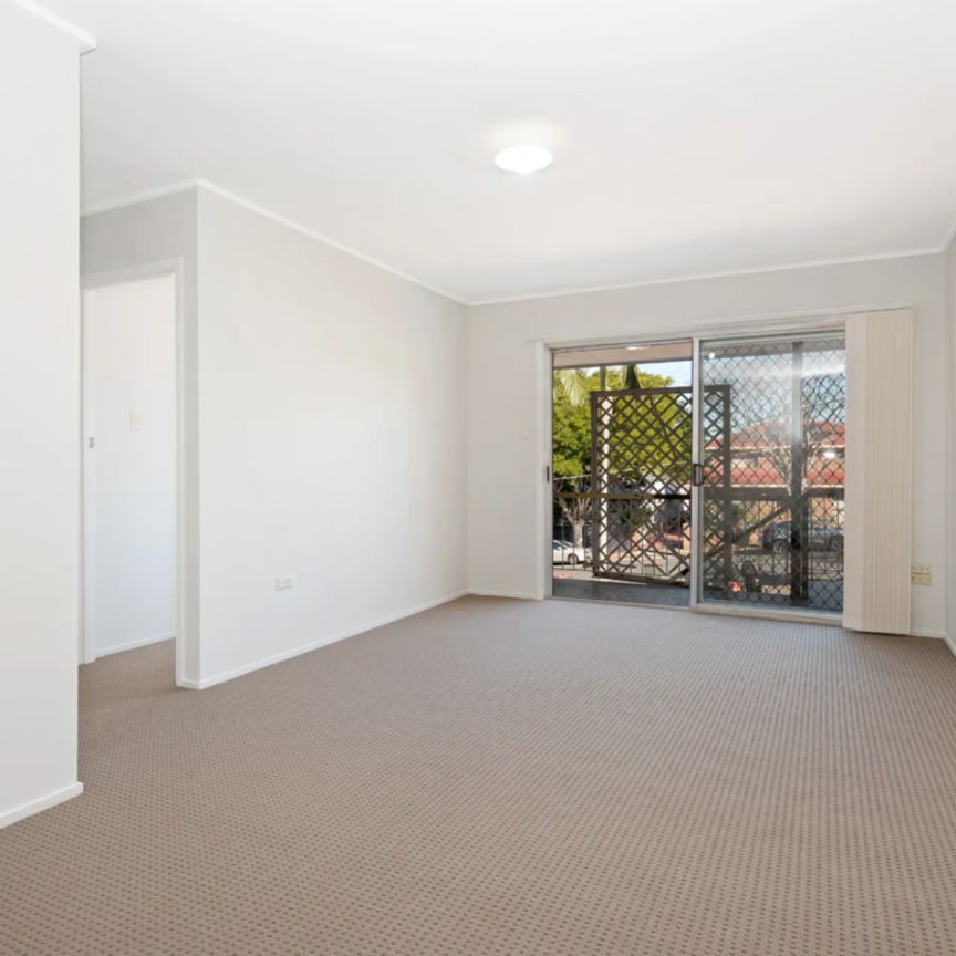 Well-Located Two-Bedroom Apartment with Carport - Photo 1