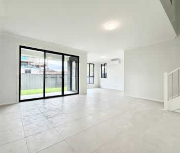 Brand-New, Effortless Modern Living in a Light-Filled Family Home - Photo 1