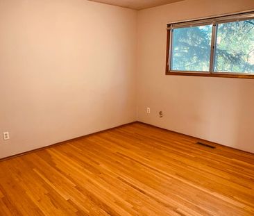 Bright 2 Bed Home Near U Of C | Garage + Laundry - Photo 5