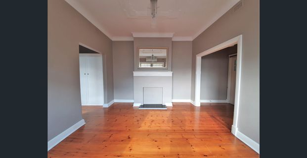 One Bedroom Upstairs Apartment Oozing Charm and Style - Photo 1