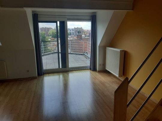 Tof dakappartement met aangenaam zonneterras. - Photo 1