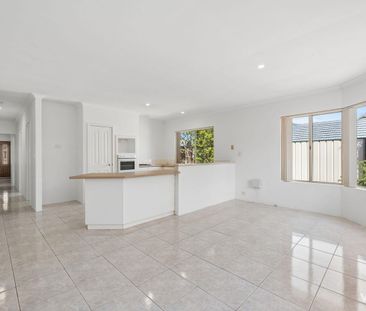 Spacious, Light-Filled Living in the Heart of Manning! - Photo 2