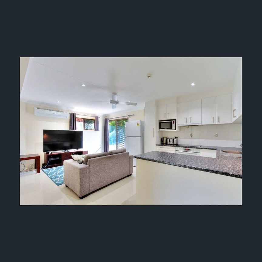 Spacious Dual Living Opportunity on a Large Flat Block with Pool - Ideal for Extended Families! - Photo 1