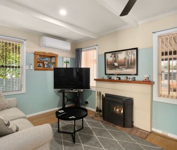 COMFORTABLE FAMILY HOME WITH GREAT SHEDDING - Photo 1