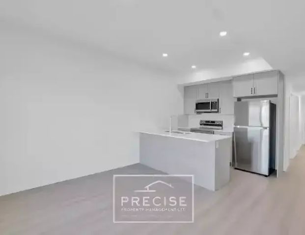 >>>DISCOUNTED RENT>> SEE BELOW>>>END UNIT: 1 Bedroom Ground Floor Unit | 727 Orchards Boulevard Southwest, Edmonton - Photo 1