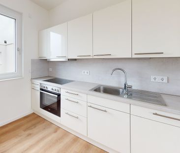 Perfekte Familienoase: Moderne 4-Zimmer-Wohnung mit sonniger Dachte... - Foto 1