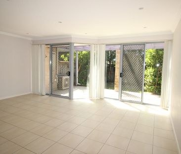 Quiet Secure Tri-level Townhouse with Distant City View & Internal ... - Photo 2