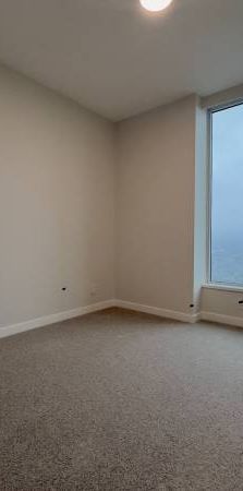 GILMORE PLACE - BRAND NEW 2B2B+DEN 55TH FLOOR - Photo 1