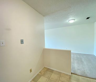 Charming 2 Bedroom Carriage Style Townhouse Condo With Unique Floor Plan And Prime Location - Photo 1