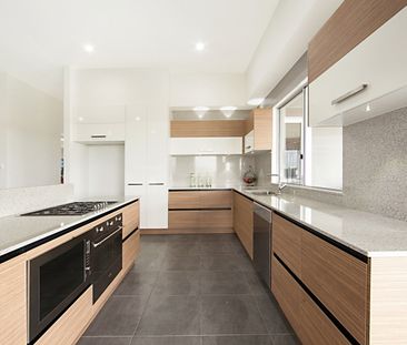 UNIQUE AND STYLISH 4 BEDROOM HOME IN MOUNT LOW! - Photo 1