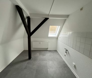 Dachgeschoss-Wohnung mit Wohlfühlfaktor – Einbauküche & Garten möglich - Foto 5