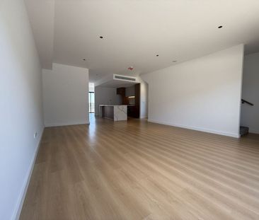 Spacious Three-Level Townhouse with Workshop & Dual Outdoor Living - Photo 4