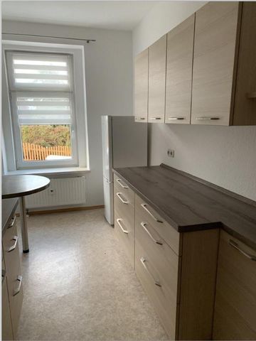 Erdgeschosswohnung mit Einbauküche - Photo 2