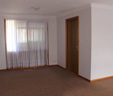 The Perfect Family Home in a Highly Sought-After Location - Photo 1