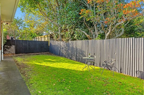 🌞 Sunny, North-Facing Brick & Tile Home - Photo 1