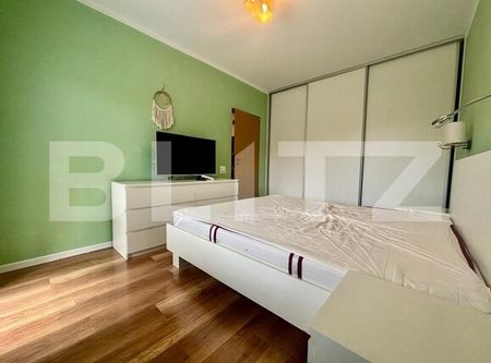 Apartament de 3 camere, parcare, 55 mp, etaj intermediar, zona Tăuți - Photo 2