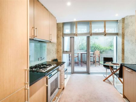 This is a wonderful "Garden Apartment" located in a landmark development in Knightsbridge. The development offers a 24 hour security team, concierge and residents pool and gym complex. - Photo 2