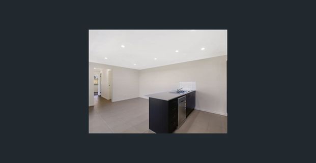 3 BEDROOM DUPLEX IN NEW ESTATE WITH OPEN PLAN KITCHEN LIVING DINING AREA AND GOOD SIZE BEDROOMS. FULLY FENCED YARD THAT EASILY FITS A TRAMPOLINE. - Photo 1