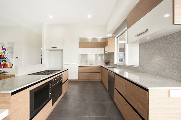 UNIQUE AND STYLISH 4 BEDROOM HOME IN MOUNT LOW! - Photo 1