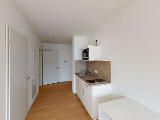 Teilmöbliertes 1-Zimmer-Apartment mit Einbauküche und Balkon - Photo 1