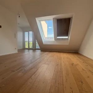 Lichtdurchflutete 2-Zimmer-Dachgeschosswohnung mit traumhaftem Grünblick im 13. Bezirk - Foto 3