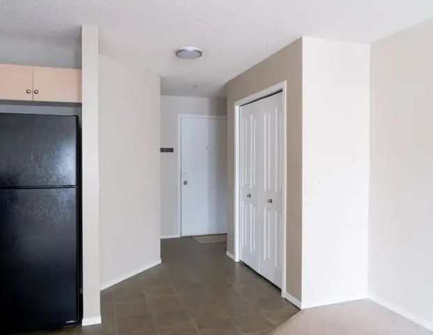 Cozy 2-beds 1-bath condo in a convenient location available for rent immediately | 10 Prestwick Bay SE, Calgary - Photo 1