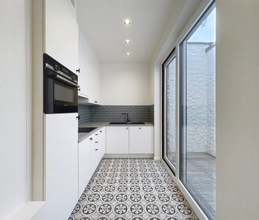Gerenoveerde woning met 3 SLPKS en stadsterras te Gent - Foto 2