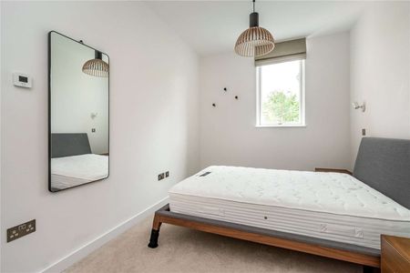 A bright, modern two-bedroom, two-bathroom apartment on the third floor with lift access, beautifully presented and move-in ready. - Photo 3